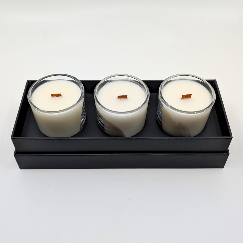 Three clear mini candles