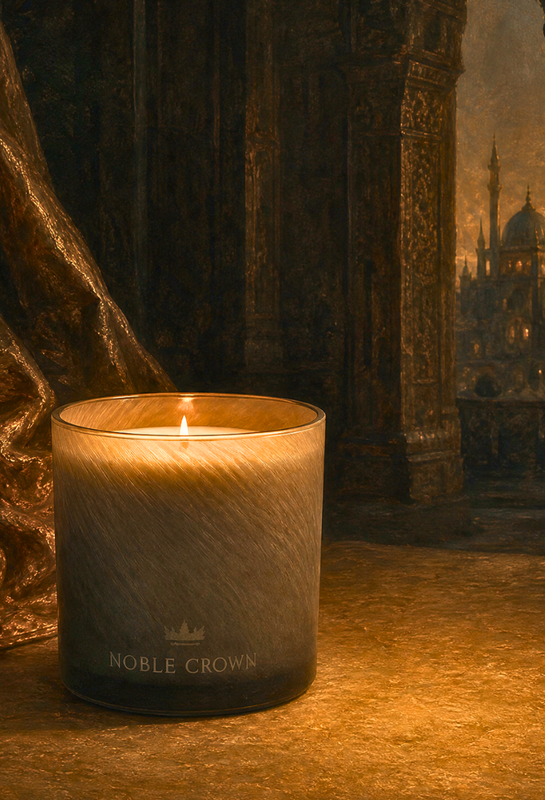 Candle with 'Noble Crown' branding in a dimly lit setting