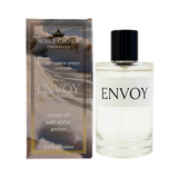 Room and linen spray bottle with packaging labeled 'Envoy' by Noble Crown Fragrances on a white background.